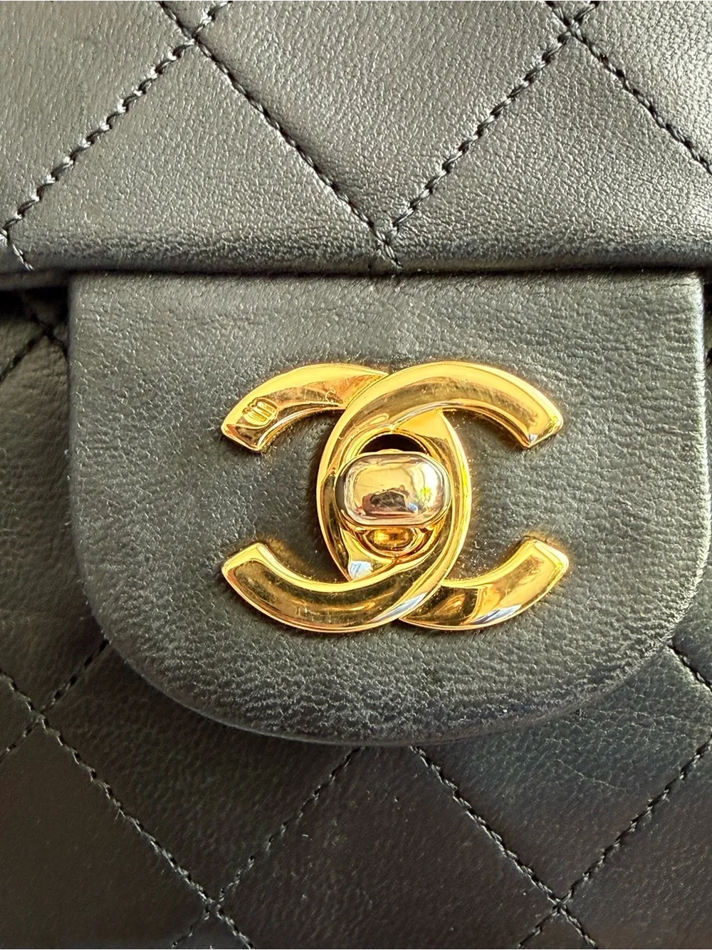 Chanel Classic Quilted Double Flap Bag in Black with Gold Hardware - Medium